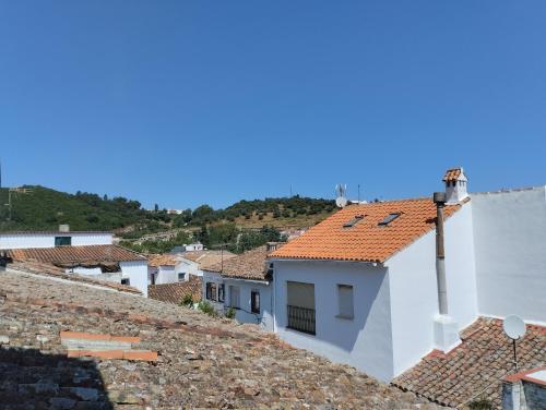 a view of the roofs of a town at Casamanuela in Aracena