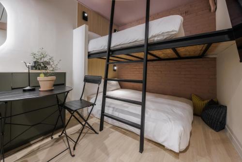 Ένα ή περισσότερα κρεβάτια σε δωμάτιο στο Hotelarrive Euljiro Tum