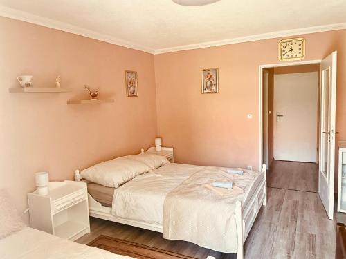Postel nebo postele na pokoji v ubytování Villa Lux