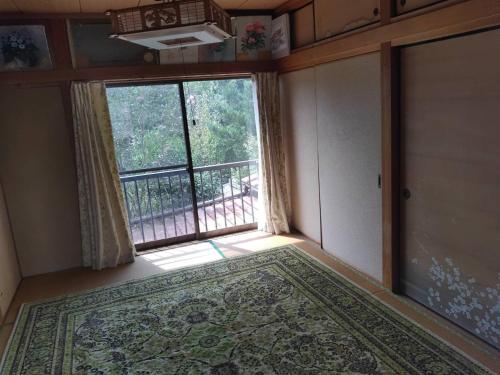 En eller flere senge i et værelse på Sakura