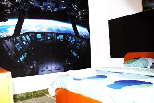 a bedroom with a bed in the cockpit of an airplane at Casa Pestera Ponicova in Dubova