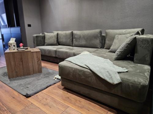 Svetainės erdvė apgyvendinimo įstaigoje Amafiore Apartment