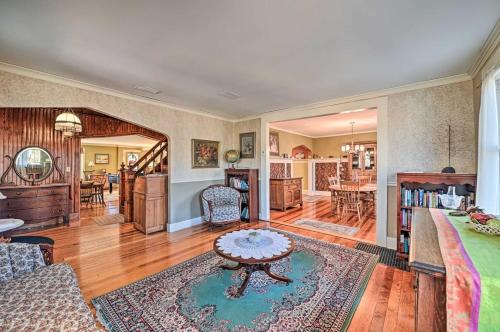 a living room with a couch and a table at 10 Mi to Gore Mountain- Home in Adirondack Park home in Olmstedville