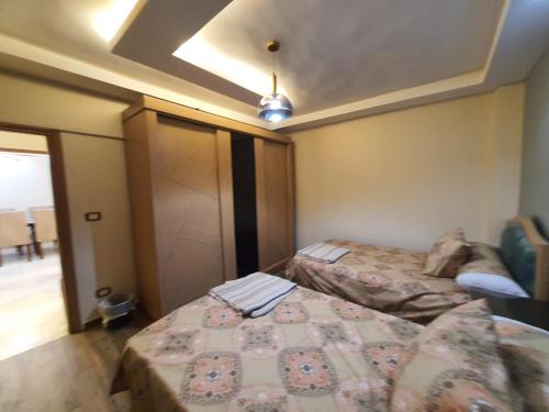 Voodi või voodid majutusasutuse عمارات ضباط مصطفى كامل toas