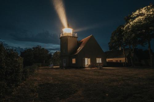 a lighthouse with a light on the top of it at The Light House in Borre