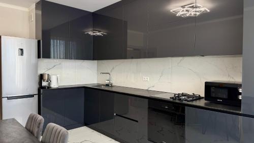 Kuchyň nebo kuchyňský kout v ubytování CityView Lodge