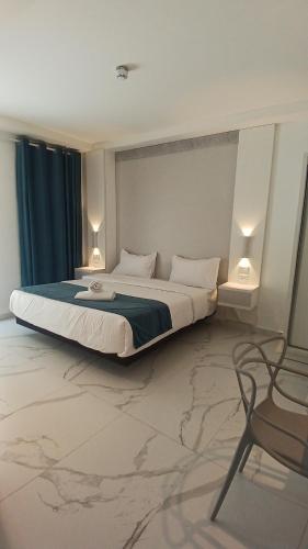 Posteľ alebo postele v izbe v ubytovaní Antonio Hotel Amman