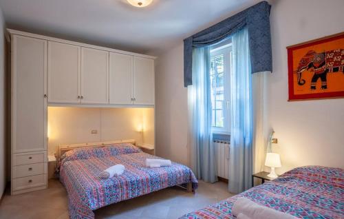 Ένα ή περισσότερα κρεβάτια σε δωμάτιο στο Villa Glicine