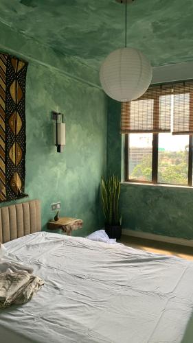 Ένα ή περισσότερα κρεβάτια σε δωμάτιο στο riverside