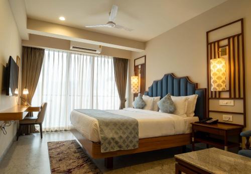 Ένα ή περισσότερα κρεβάτια σε δωμάτιο στο Titanic Boutique Hotel