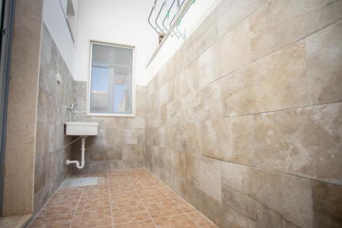 Koupelna v ubytování Samarà Sx