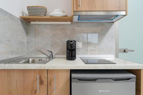 Dapur atau dapur kecil di JoLyk Apartments
