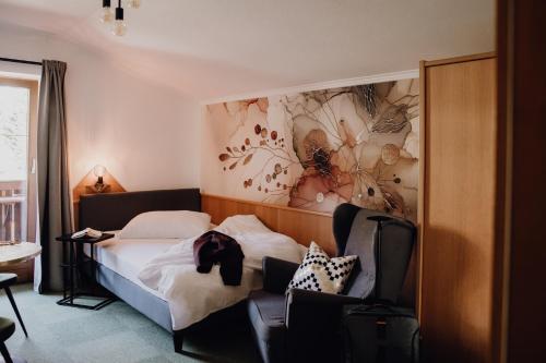 Posteľ alebo postele v izbe v ubytovaní Dorfcafe Unken Hotelpension sWirtshaus im Dorf