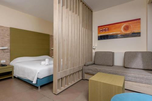 Katil atau katil-katil dalam bilik di ALEA Hotel & Suites