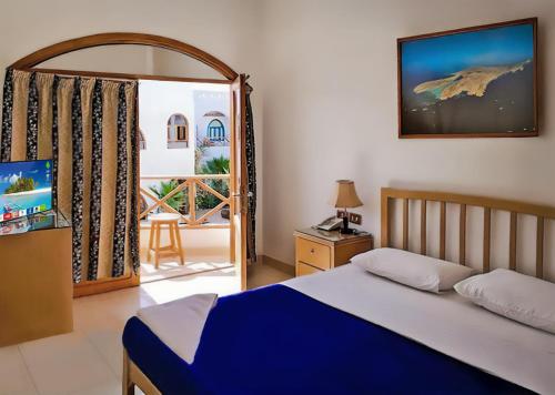 Postel nebo postele na pokoji v ubytování Red Sea Relax Hotel