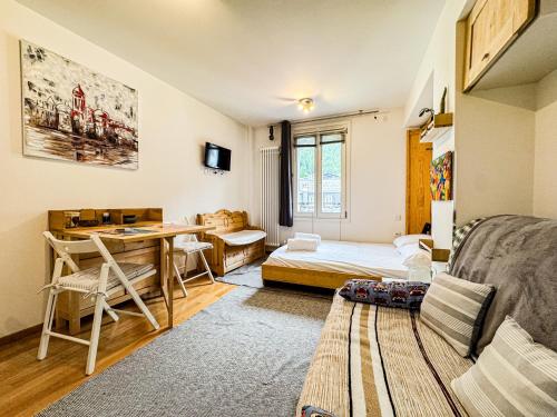 Ένα ή περισσότερα κρεβάτια σε δωμάτιο στο Studio 4810 Centre Chamonix