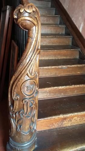 an ornate wooden rail on a stair case at Hôtel Les Templiers in Luz-Saint-Sauveur