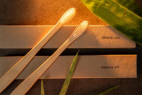 three wooden chopsticks sitting on top of three boxes at Divino Gili Air in Gili Air