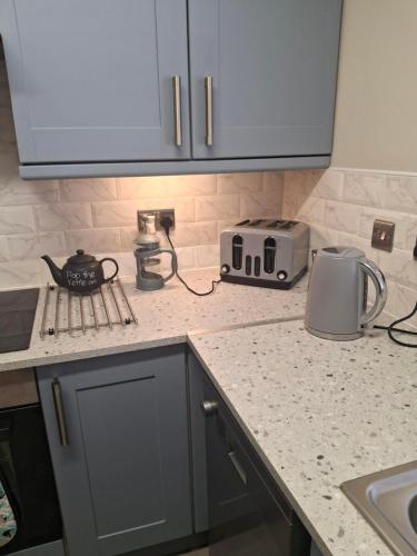 Η κουζίνα ή μικρή κουζίνα στο 1 Bedroom UlsterApartments