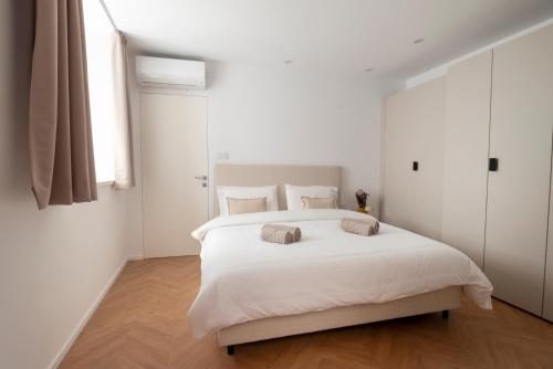Ένα ή περισσότερα κρεβάτια σε δωμάτιο στο Apartment Merano Mitte