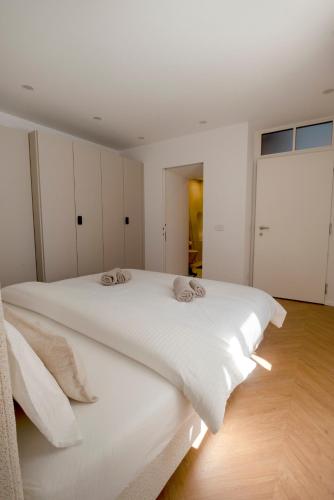 Ένα ή περισσότερα κρεβάτια σε δωμάτιο στο Apartment Merano Mitte