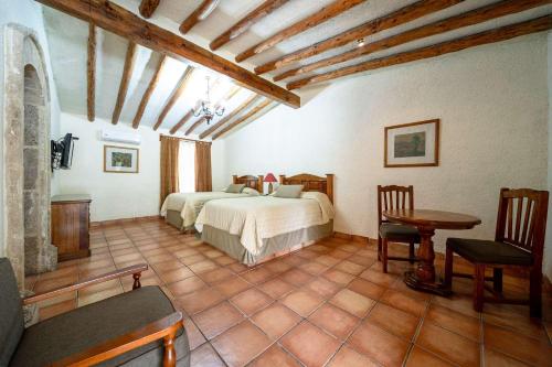 Una cama o camas en una habitación de Rincón Del Montero