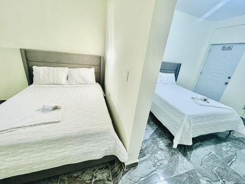 Postel nebo postele na pokoji v ubytování New hotel neo