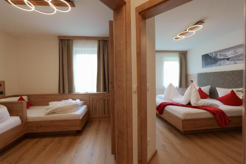 Ein Bett oder Betten in einem Zimmer der Unterkunft Ferienhof Kasparbauer