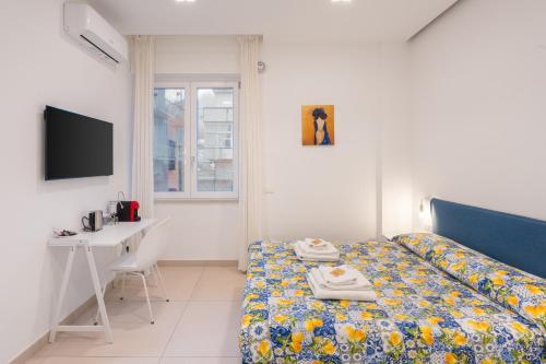 Postel nebo postele na pokoji v ubytování Brezza di Stabia Rooms