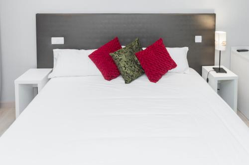 Ένα ή περισσότερα κρεβάτια σε δωμάτιο στο Hostal Aslyp 114