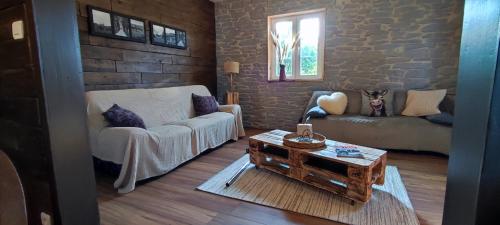 Ruang duduk di Chalet aux 2 sapins