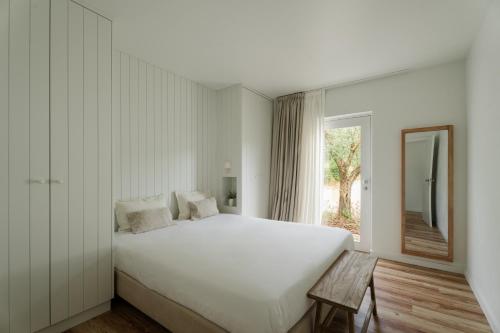 Ένα ή περισσότερα κρεβάτια σε δωμάτιο στο IMAGO Houses - Private Pool - Douro Valley - by MET