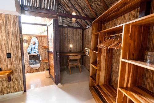 an inside view of a room with wooden walls at La Playita Isla Fuerte in Isla Fuerte