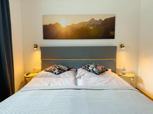 Postel nebo postele na pokoji v ubytování Apart Pair im Dorf