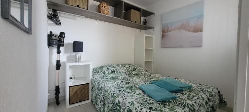 Postel nebo postele na pokoji v ubytování Palm Appart