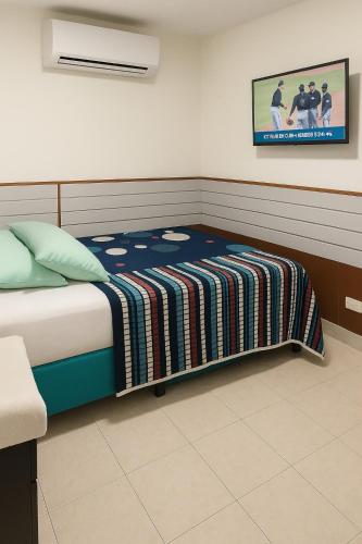 Ένα ή περισσότερα κρεβάτια σε δωμάτιο στο Hostal Marhú