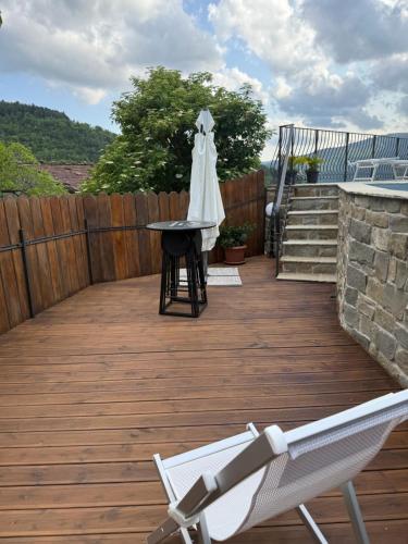 a wedding dress on a table on a deck at B&B A…Monte in Santa Maria