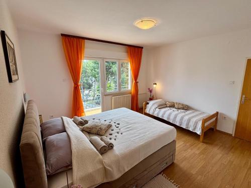 Postel nebo postele na pokoji v ubytování House Helena