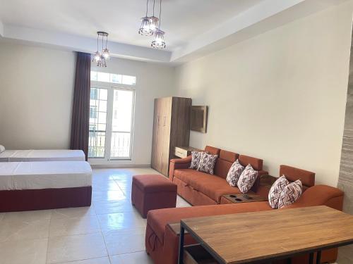 Katil atau katil-katil dalam bilik di Luxury Studio Apartment in New Alamein