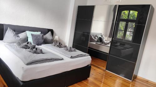 Llit o llits en una habitació de Ferienwohnung Cottbuser City II