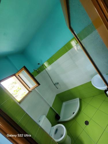 an overhead view of a bathroom with two toilets at Villa Arilena in Sarandë