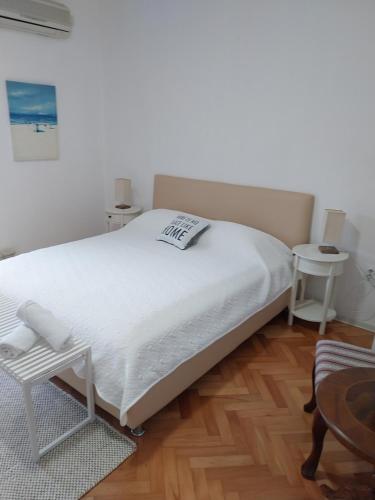 Postel nebo postele na pokoji v ubytování Jon