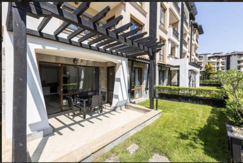 an external view of a house with a pergola at Oasis Beach Club - "Valencia'' apartment in Lozenets