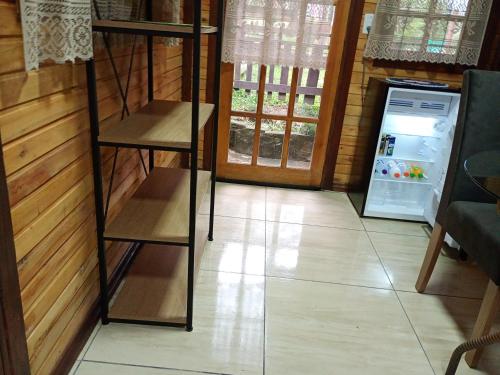 Kuchyň nebo kuchyňský kout v ubytování Hospedagem flor dos manacás