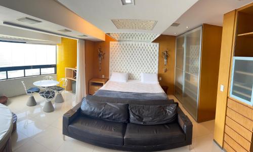 Postel nebo postele na pokoji v ubytování Luxuoso Apart-hotel Beira-mar
