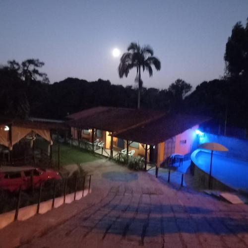 Bazén v ubytování Pousada Recanto do Tortuga Guapimirim nebo v jeho okolí