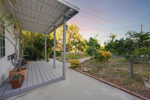 a porch of a house with potted plants at Quiet and Central 1bed1bath House, Nature Retreat in Rosemead
