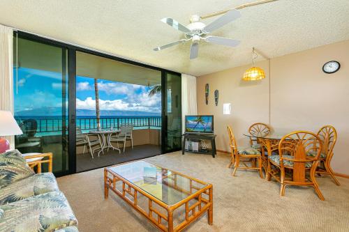 a living room with a couch and a table at Paki Maui #103 condo in Kahana