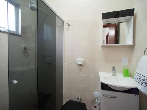 A bathroom at Sweet Rio Residence Taquara