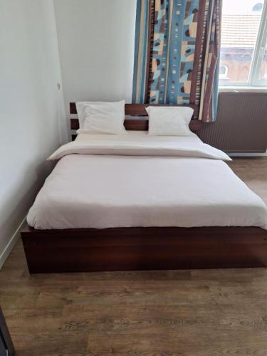 Postel nebo postele na pokoji v ubytování Maison sympa